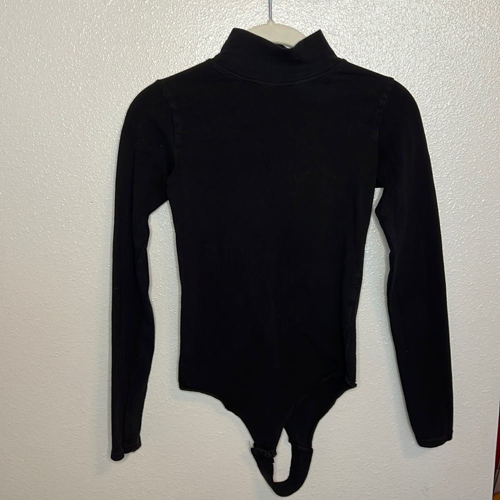 Brandy Melville black mock neck bodysuit. One size, but fits like a Small